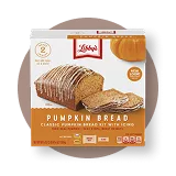 Front view photograph of a light orange and brown box of Libby’s Pumpkin Bread Kit on an orange distressed circle. It has the Libby’s name and red and white logo above two loaves and two slices of pumpkin bread and a dark orange and white label that features the product name in white under an illustrated pumpkin.