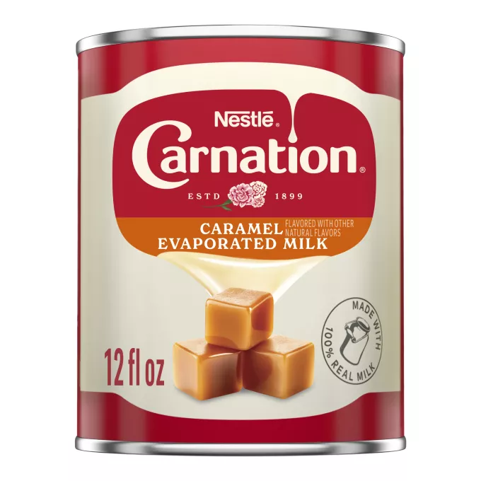 Front Center view of CARNATION Evaporated Milk Caramel 12floz can NET 12 fl oz (354 mL) product.