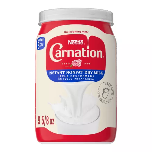 Front Center view of CARNATION Mlk Dry Non Fat Dry Milk 9.625 Ounce Can NET WT 9 5/8 oz (272 g) product.