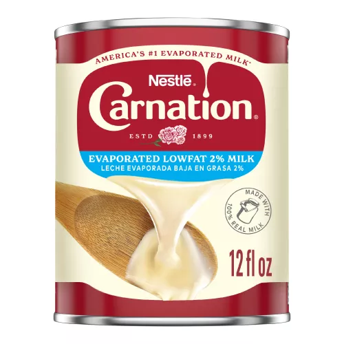 Front Center view of CARNATION Evaporated Lowfat 2% Milk 12 fl. oz. Can NET 12 fl oz (354 mL) (bilingual) product.