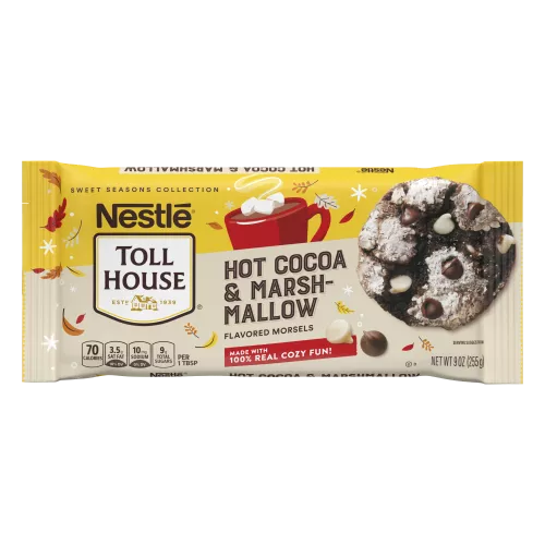 Bag of hot cocoa & marshmallow flavored morsels with illustrated cup of hot cocoa and falling leaves and a chocolate cookie.