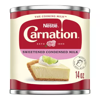 Vista frontal centrada de Leche condensada azucarada Carnation 14oz con PESO NETO de 14oz (397 g).