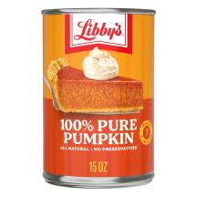 An orange and yellow can of 100% Pure Pumpkin with a slice of pumpkin pie on a silver serving spatula.