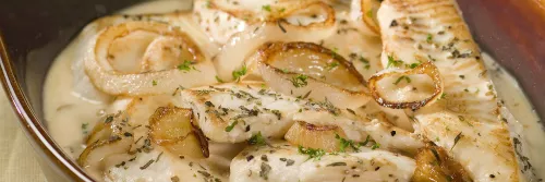 Fish Baked in Creamy Milk Sauce with Onions and Herbs Long Left