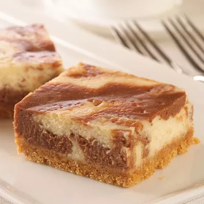 Swirled Peanut Butter Chocolate Cheesecake Bars
