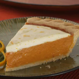 Zesty Cream Topped Orange Pumpkin Pie