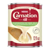 Front Center view of CARNATION Fat Free Evaporated Milk 12 fl. oz. Can NET 12 fl oz (354 mL) (bilingual) product.